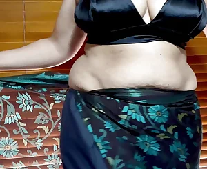 Warm Indian Wifey Suspending Gorgeous Saree and Sleeveless Half-top - Titillating and Softcore - Jugs Have fun